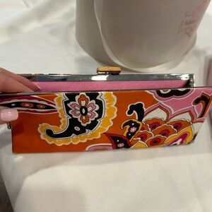 Pucci inspired print cloth with bamboo closure.